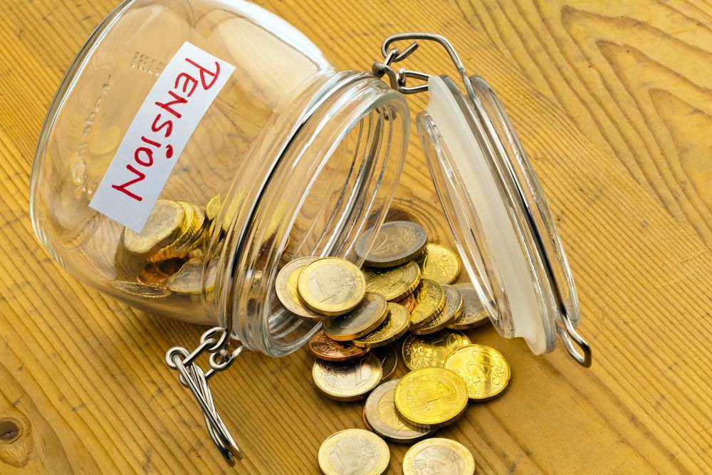 A coins jar for saving for pension