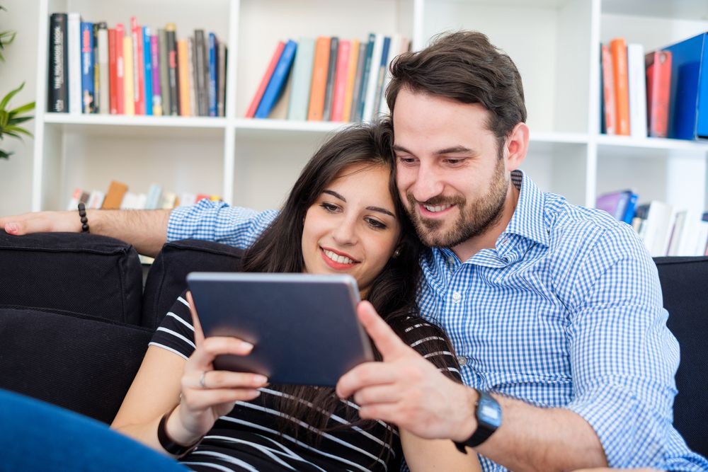A couple using a tablet