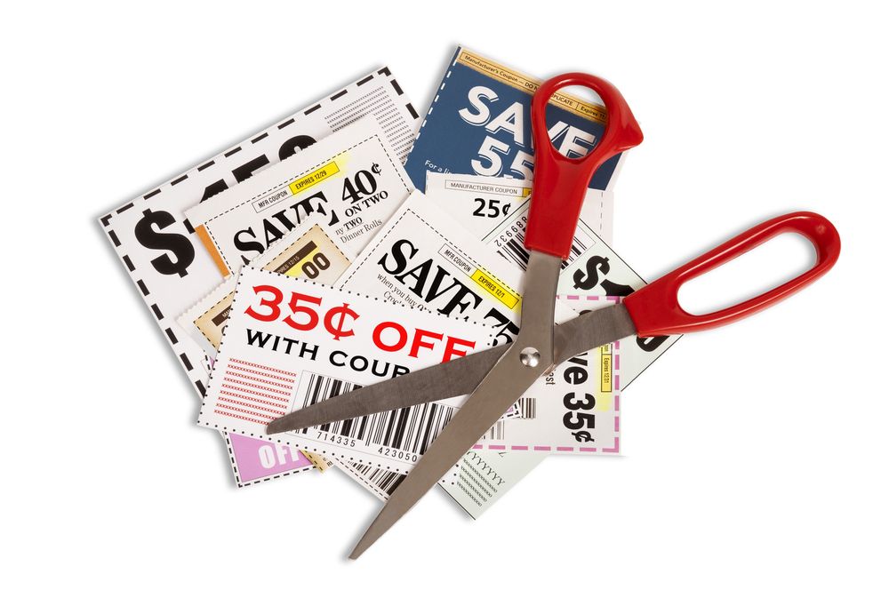 Coupons and a pair of scissors