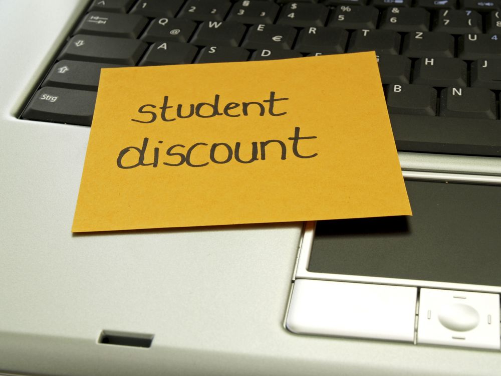 A yellow paper with "student discount" written on it