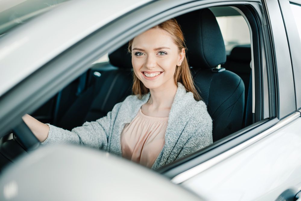 A woman driving a car