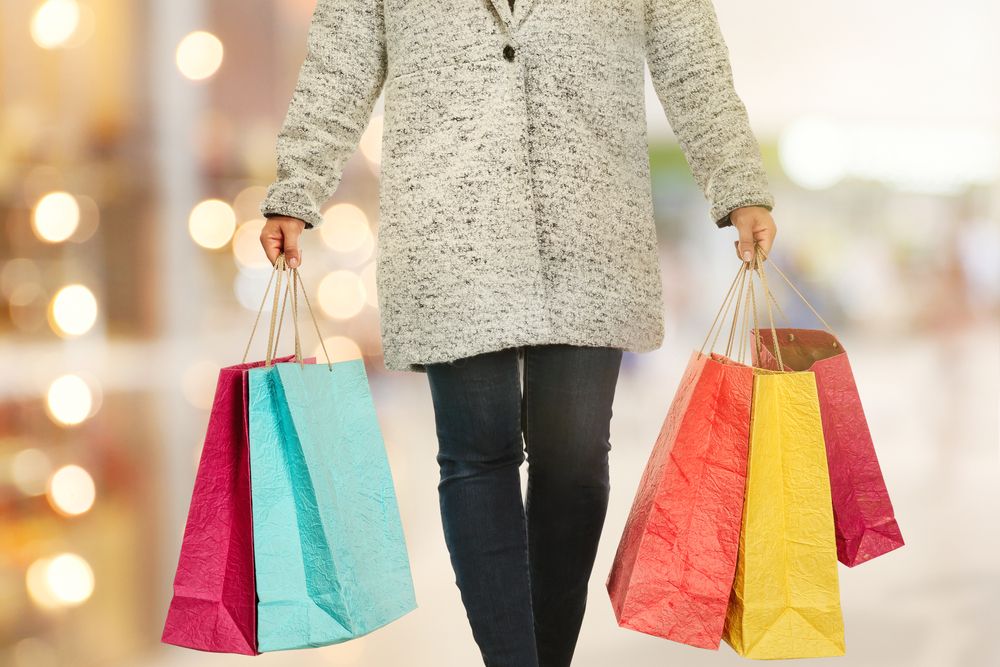 A woman holding paper bags