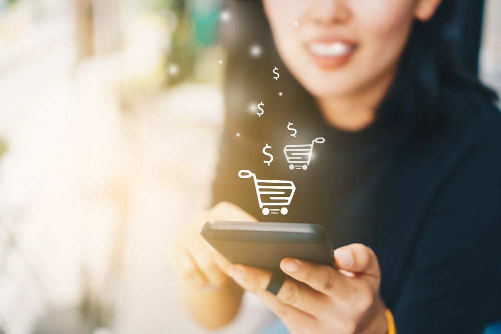 A woman holding a mobile phone