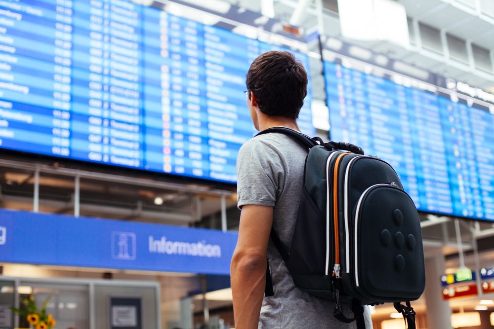 A young man at the airport