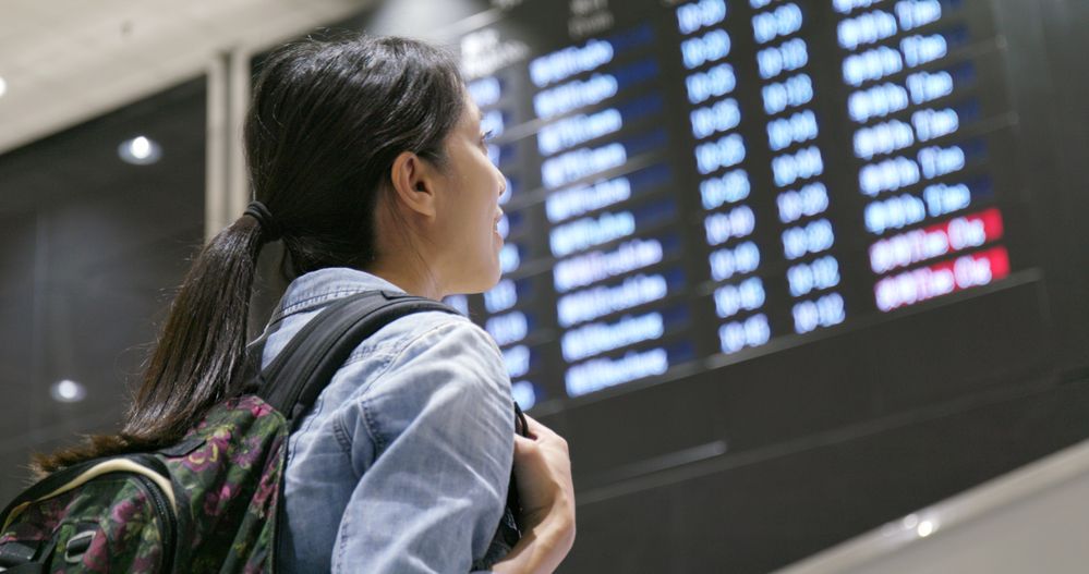 A young woman inside the airport